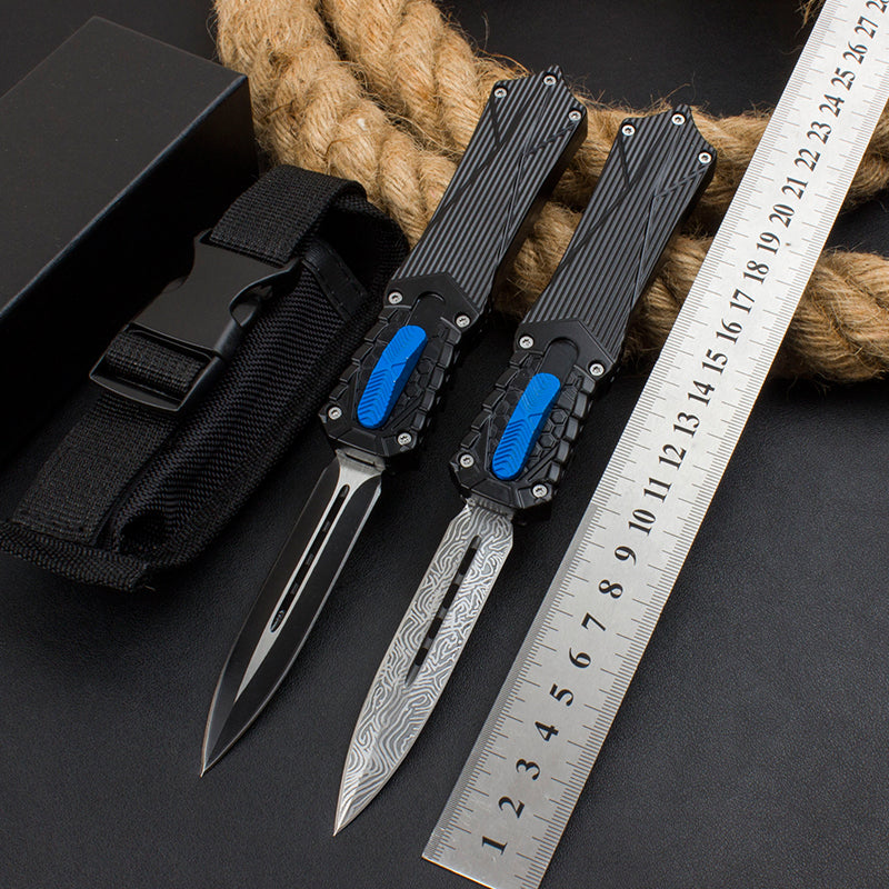 Out-the-Front (OTF) automatic knife