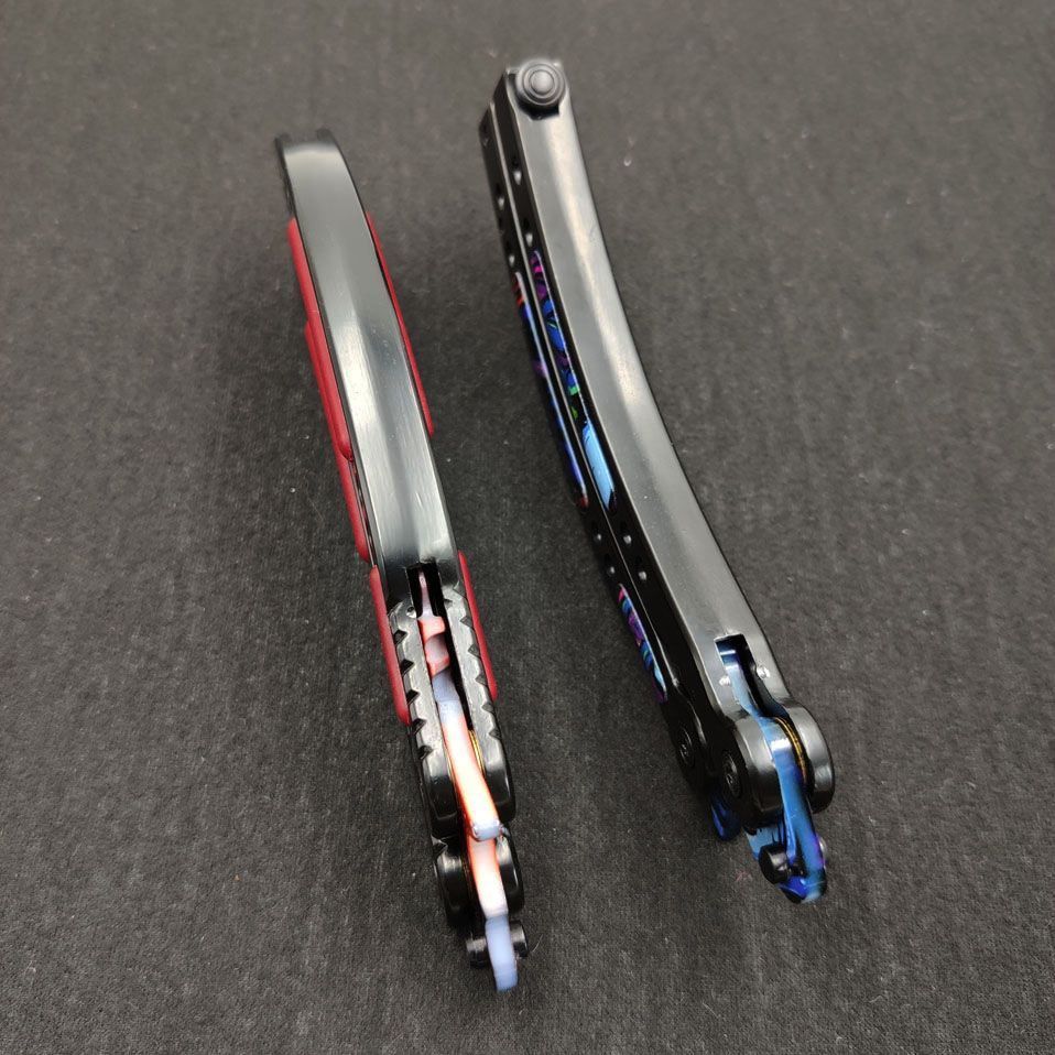 All-steel gradient folding butterfly practice knife, non-porous, unsharpened, with spring lock clasp