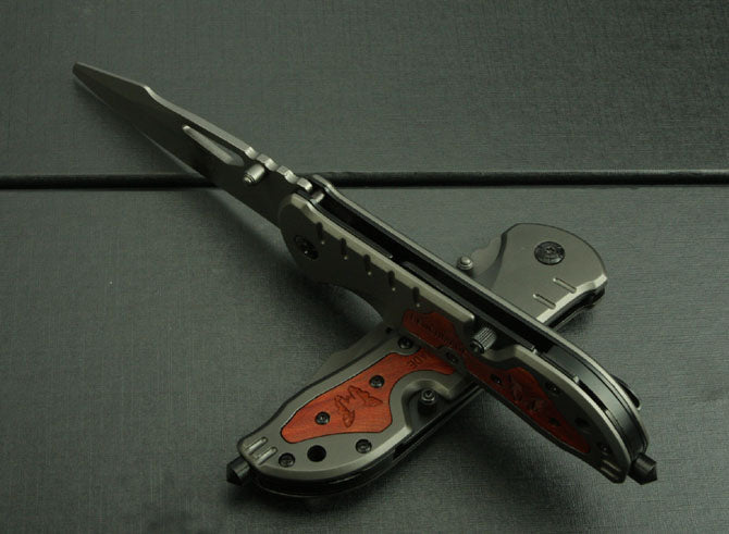 Survival folding knife