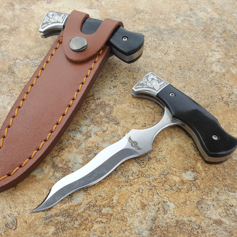 hand stiletto (ox horn handle with serpentine blade)