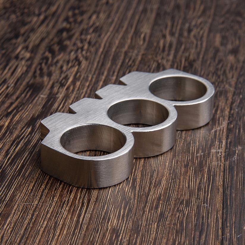 Brass Knuckles Paperweight
