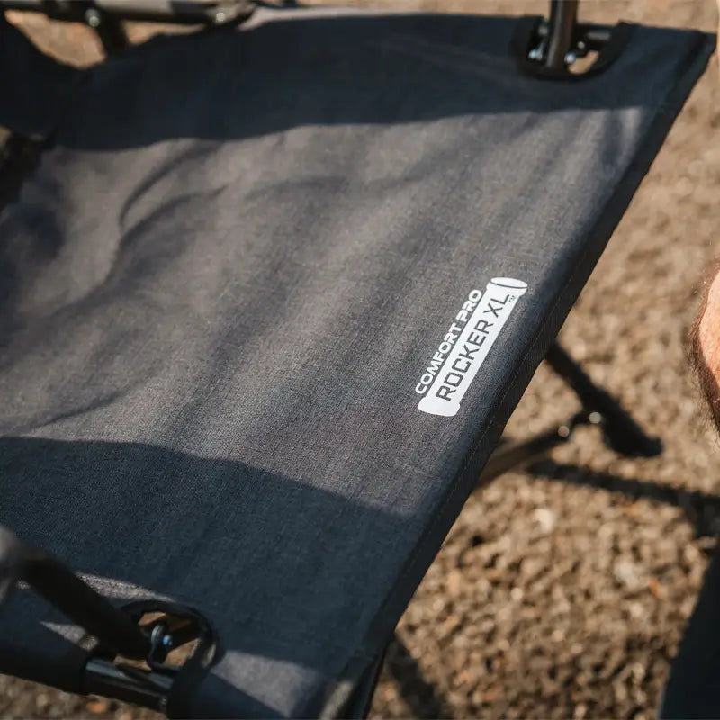 Fabric detail showing the "Comfort Pro Rocker XL" branding on the seat.