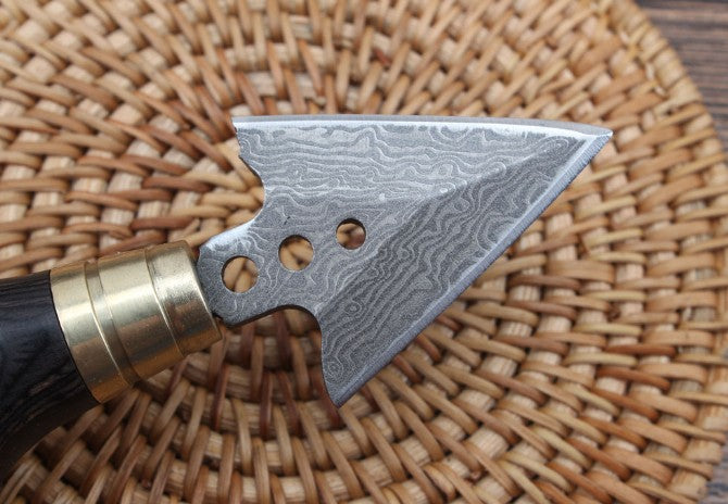 Ebony arrowhead hand stiletto