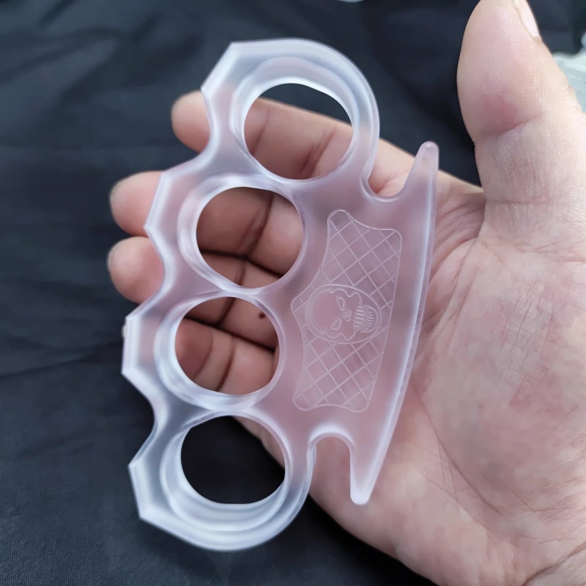 Plastic brass knuckles
