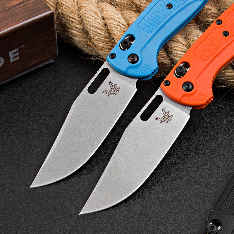 Axis-lock folding knife with fiberglass handle