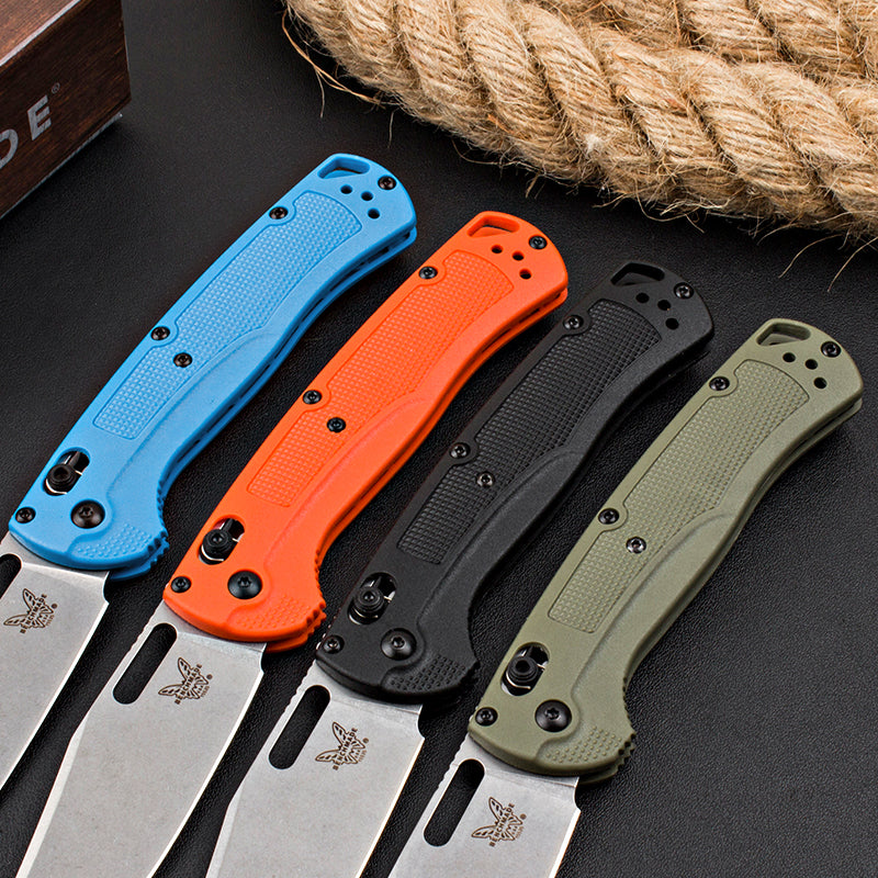 Axis-lock folding knife with fiberglass handle