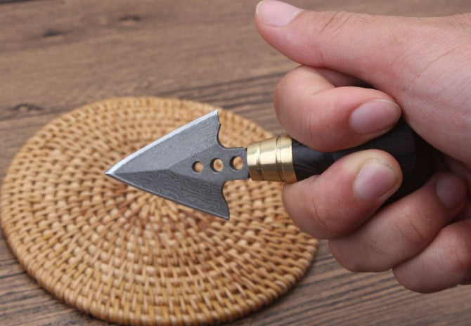 Ebony arrowhead hand stiletto