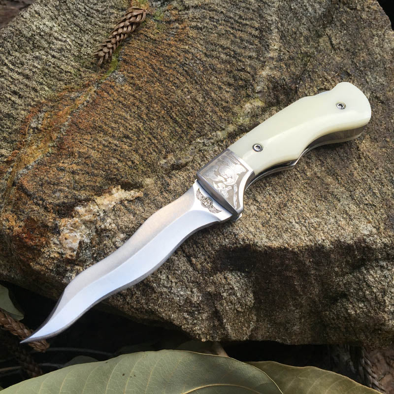 Bone-imitated serpentine hand stiletto